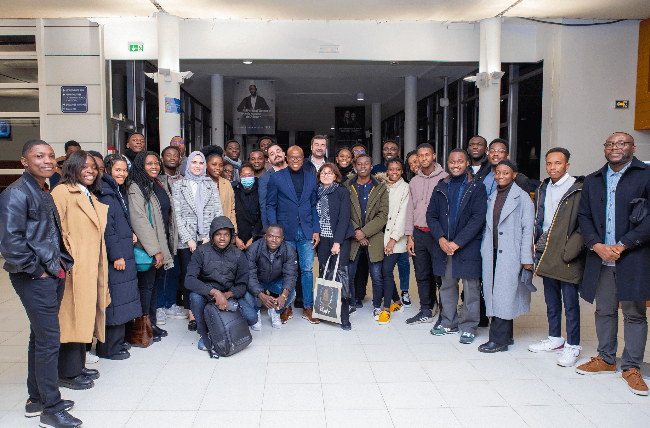 Panelists, organizers and members of the public after the event  