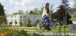 Girl on bike HEC Paris