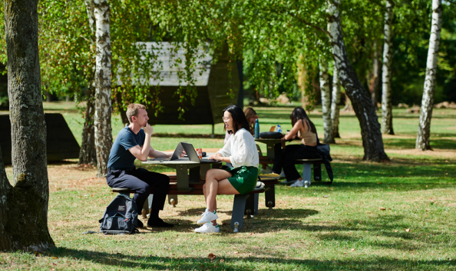 HEC students on tables_cover